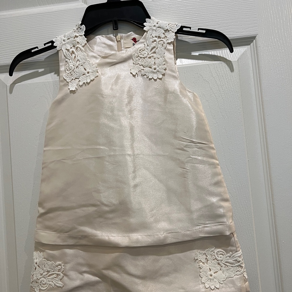 Elegant Cream Sleeveless Dress with Lace Details